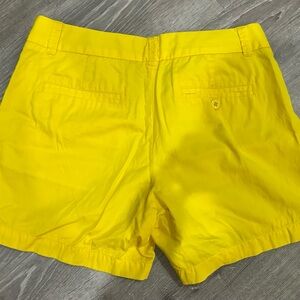 J Crew chino broken in shorts. Size 2.  5” inseam. Yellow